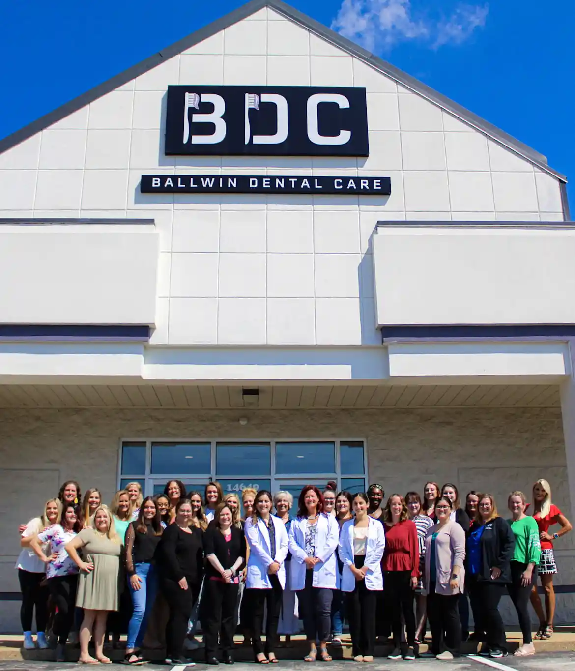 Full BDC Team Photo in front of the dental office